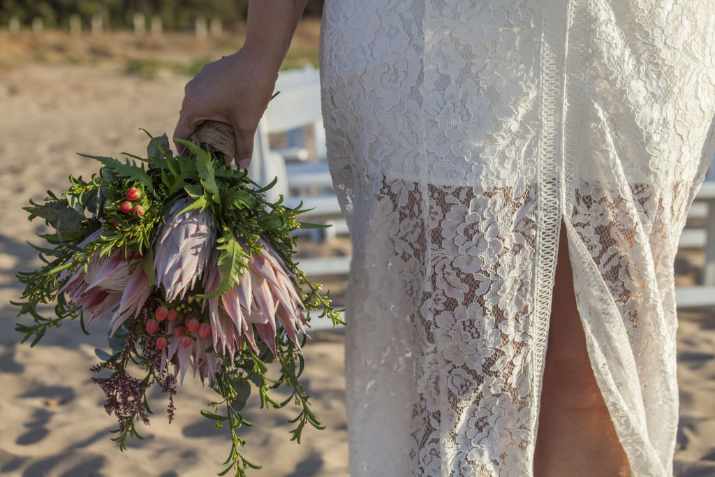 Bride's dress and bouquet of flowers, Darwin, Australia