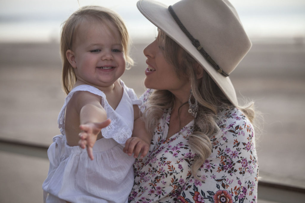 Sister-in-law with bride's baby at wedding, Darwin, Australia