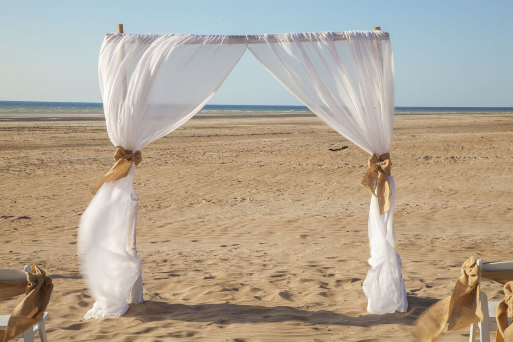 Wedding arch on beach in Darwin Australia