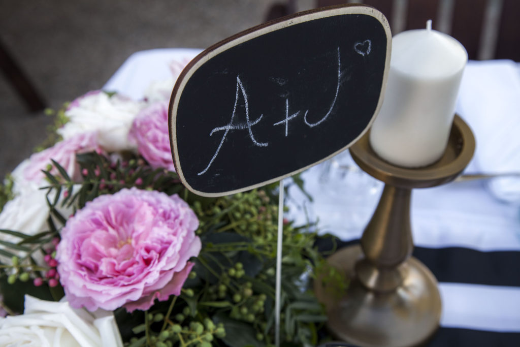 Alex and Jenny's place setting at wedding reception