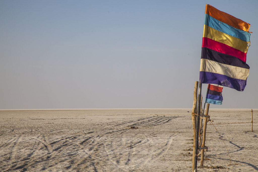 Flag flapping in the wind at White Rann of Kutch, Gujarat, India