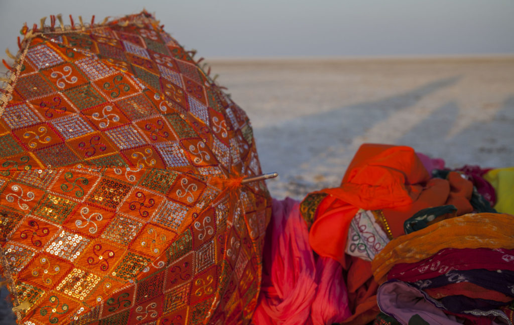 Traditional attire on sand at White Rann of Kutch, Gujarat, India