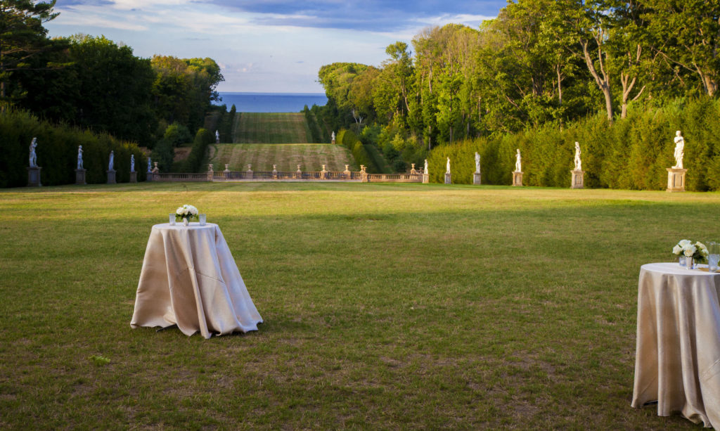 wedding reception tables outdoors near ocean Crane Estate New England USA