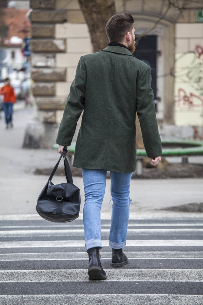 Man crossing the street in Ljubljana, Slovenia