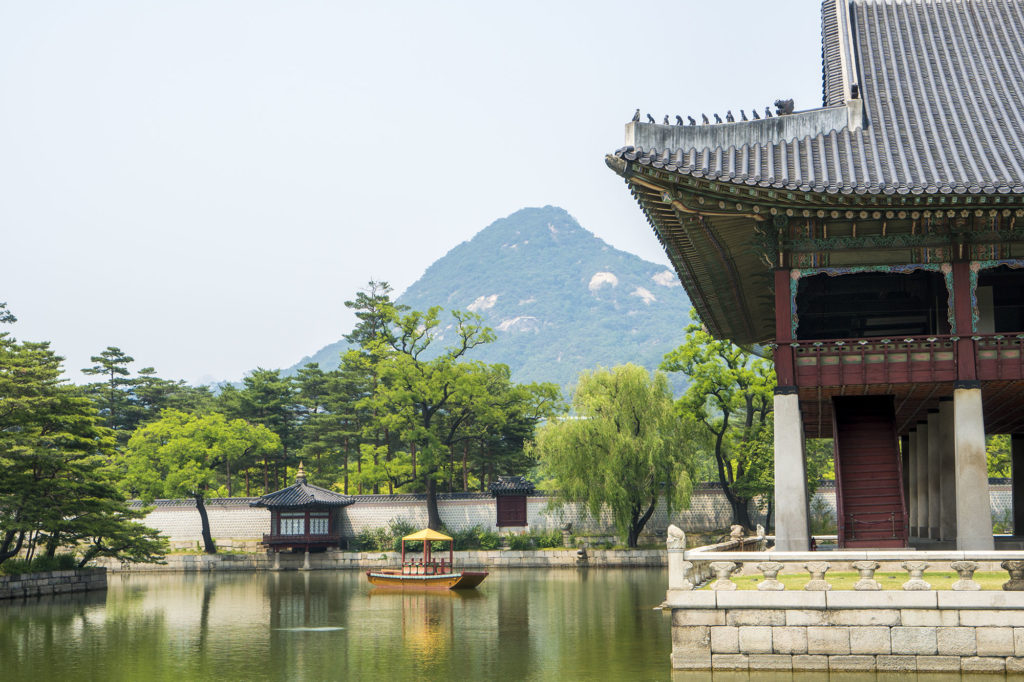 Pond and building inside Gyeongbokgung Palace Seoul Republic of Korea