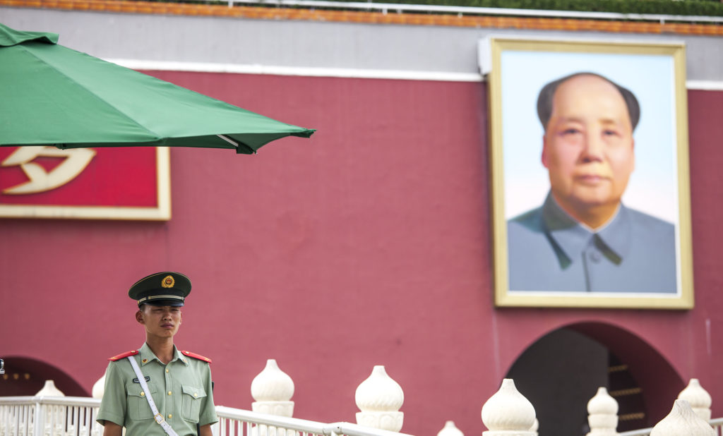 Young Chinese soldier outside the Forbidden City Tiananmen Square China